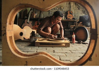 An Acoustic Guitar Maker Is Busy Working On His Order. Surabaya Indonesia 23 Maret 2017