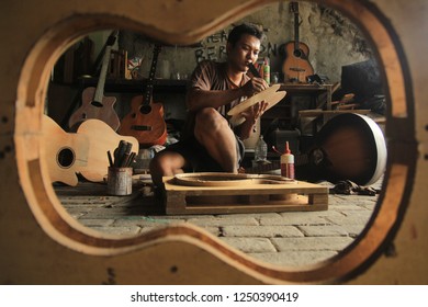 An Acoustic Guitar Maker Is Busy Working On His Order. Surabaya Indonesia 23 Market 2017