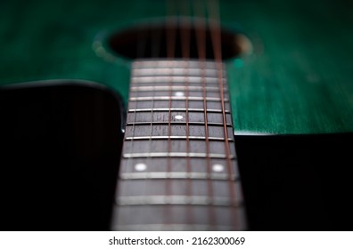 Acoustic Guitar Metal Strings In Closeup. Professional String Musical Instrument For Guitarist. Curated Collection Of Royalty Free Images And Photos For Music Wallpaper And Poster Design