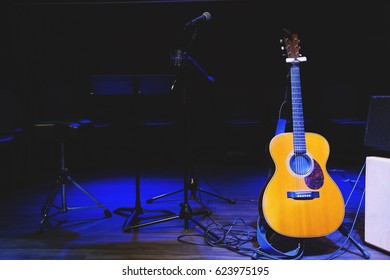 Acoustic Guitar. Musical Instrument With On Stage In Concert.