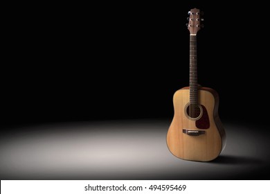 Acoustic Guitar On A Black Background