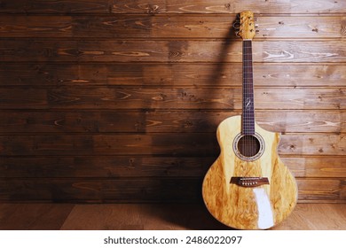 Acoustic Guitar on Wooden Background - Powered by Shutterstock