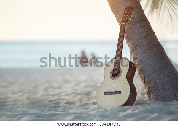 Acoustic Guitar Standing Sandy Beach Under Stock Photo (Edit Now) 394147933