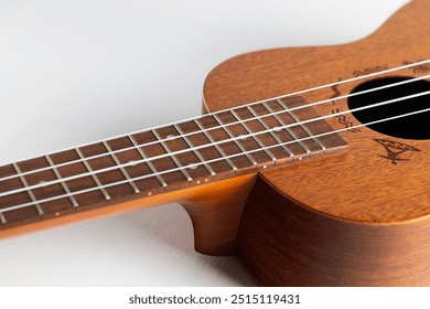 acoustic Ukulele Hawaiian Guitar. a wooden ukulele with strings. musical instrument isolated on white background - Powered by Shutterstock