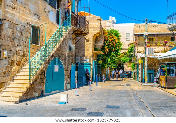 ACRE, ISRAEL, SEPTEMBER 12, 2018: Narrow street in\
the old town of Akko,\
Israel