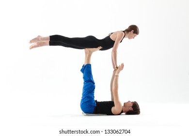 Acrobatic balance - Powered by Shutterstock