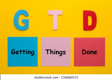 Acronym of GTD for Getting Things Done written on a note.