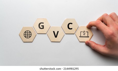 Acronym GVC Or Global Value Chain. Icons On Wooden Forms