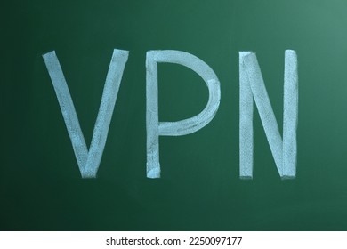 Acronym VPN (Virtual Private Network) written on chalkboard