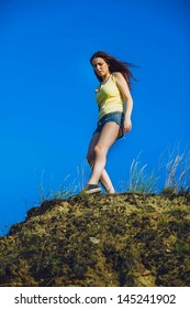 Acrophobia Punk Woman Hippie Suicide Tall Stands On Top Of A Rock Cliff Edge And Is Fearful Horror