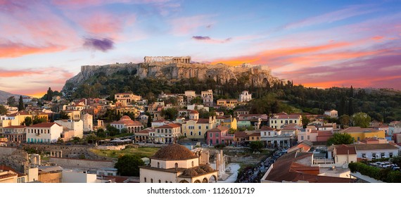 Acropolis of Athens at sunset and the old city in the foreground