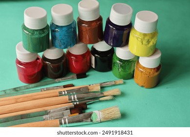 acrylic paints, paint jars, brushes, art supplies, painting, drawing, art, creativity, colors, artist, palette, paints, painting tools, studio, art materials, creative supplies, paint brushes, bright  - Powered by Shutterstock