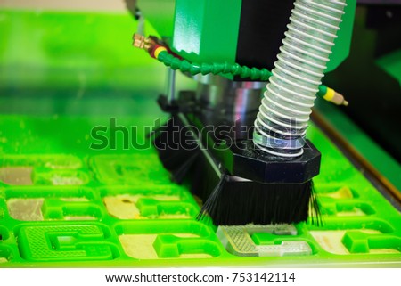 Acrylic sheet carving machine.Flatbed cnc machine working.