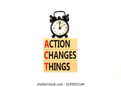 ACT action changes things symbol. Concept words ACT action changes things on wooden blocks on a beautiful white table white background. Business and ACT action changes things concept. Copy space.