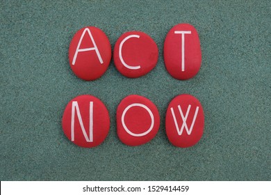 Act Now Slogan, Climate Emergency Protest Sign Composed With Red Colored Stones Over Green Sand