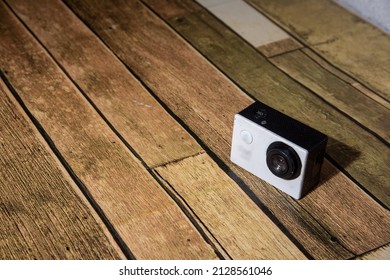 Action camera, 8k 16k 296bit system on wooden floor