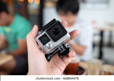 An action camera or action-cam is a digital camera designed for filming action while being immersed in it. Action cameras are therefore typically compact and rugged, and waterproof at surface. - Shutterstock ID 468844478