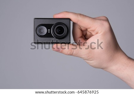 Action camera in a hand 