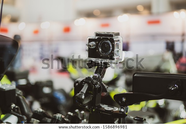Action camera mounted on\
a motorcycle.