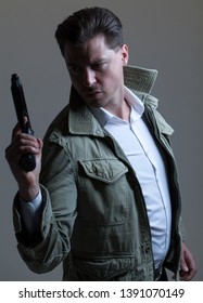 Action Hero / Spy Thriller – Attractive Caucasian Male With Brown Hair, Holding Gun