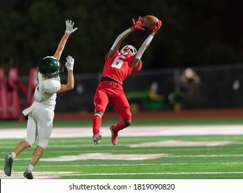 Action photos of football players making amazing plays during a competitive game