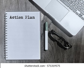 Action Plan, Typed Words On a handbook with note book, marker pen and notebook. Vintage and classic background mood with noise. - Shutterstock ID 571319575