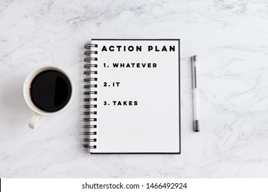 Action Plan Whatever It Takes writing on notebook. Notebook on desk with coffee cup and a pen.