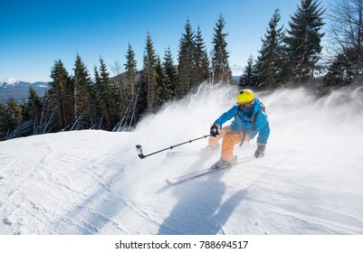 Action Shot Of Professional Skier Taking Selfies Photo With A Camera On Selfie Stick While Skiing On Fresh Powder Snow In The Mountains At The Winter Resort Bukovel Active Lifestyle Sport Concept