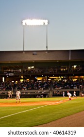 Action Taken At A Minor League Baseball Game Taken With A 45 Mm Tilt/shift Lens.