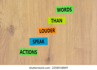 Actions speak louder words symbol. Concept words Actions speak louder than words on colored paper. Beautiful wooden background. Business new mindset for results concept. Copy space. - Shutterstock ID 2258518849