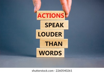 Actions speak louder words symbol. Concept words Actions speak louder than words on wooden blocks. Beautiful grey table grey background. Business new mindset for results concept. Copy space. - Shutterstock ID 2260540261
