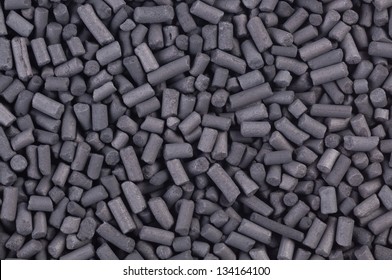 Activated carbon granules abstract background
