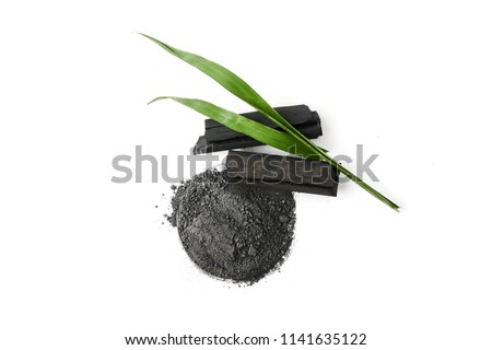 Activated charcoal powder on white background