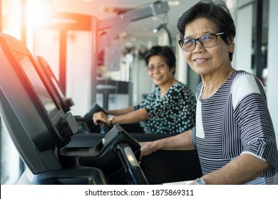 Active Asia Senior Old Women People Walk Training Exercise On Treadmill For Fit Healthy At Home Gym.