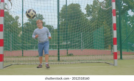 Active ball games. There are different intervention that can specifically target children with Down syndrome to enhance physical activity level or help achieve motor skill patterns for functionality. - Shutterstock ID 2012518160