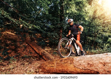 Active bicyclist riding at the forest.Healthy lifestyle and outdoors adventure.
