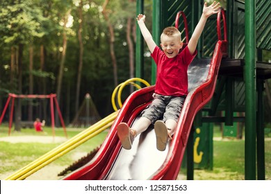 Active Boy Sliding Down