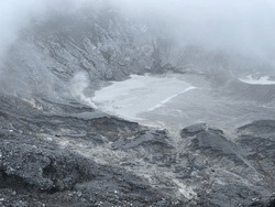 An Active Crater Spewing Sulfuric Smoke Into The Atmosphere
