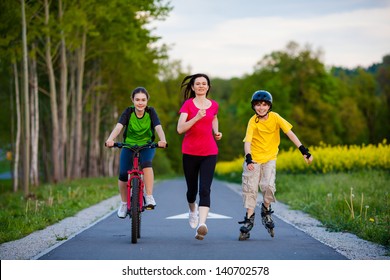 Active family - mother and kids running, biking, rollerblading - Powered by Shutterstock