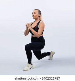 Active and fit physique senior woman warming up before exercise on isolated background. Healthy lifelong senior people with fitness healthy and sporty body care lifestyle concept. Clout