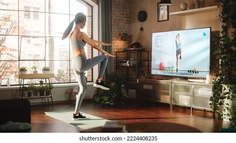 Active Girl Workout, Watching Personal Trainer Through Online Video Tutorial While Training At Home. Athletic Fit Woman Using Technology, Streaming Service Fitness Subscription For Virtual Training