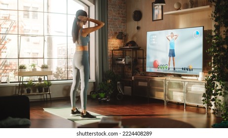 Active Girl Workout, Watching Personal Trainer Through Online Video Tutorial While Training At Home. Athletic Fit Woman Using Technology, Streaming Service Fitness Subscription For Virtual Training