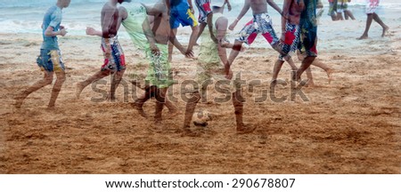 Active group young male people playing soccer on tropical beach 
Young men and boys playing game near coastline in the sand. Double exposure and filtered image for retro style effect