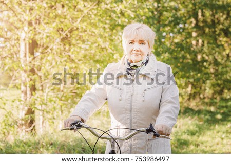 Similar – Smiling senior woman in wheelchair