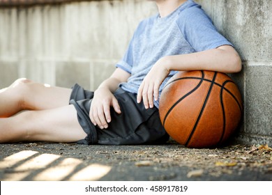An active kid with a basketball