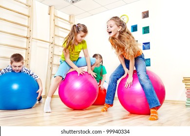 Active Kids Jump On Gymnastic Balls