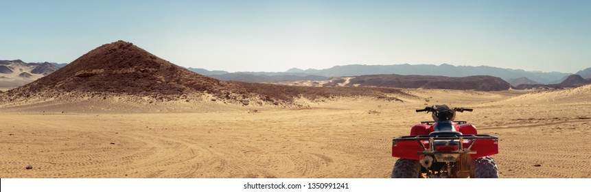 Active Leisure And Adventure In A Stone Desert On Sinai Peninsula - Extreme Tour And Safari On Quad Bikes For Tourists. Wide Panorama Of Mountain Landscape With Quads In Egypt, No People.