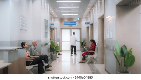 Active Local Indian Health Clinic Corridor, Representing Modern and Advanced Healthcare Services with Nurses and Doctors. Diverse Patients Waiting in Reception Hall in a Hospital - Powered by Shutterstock