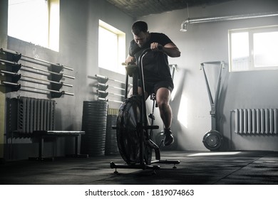 Active Male Has Workout On Stationary Bike . - Powered by Shutterstock