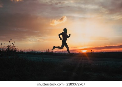 active man silhouette running at sunset - Powered by Shutterstock